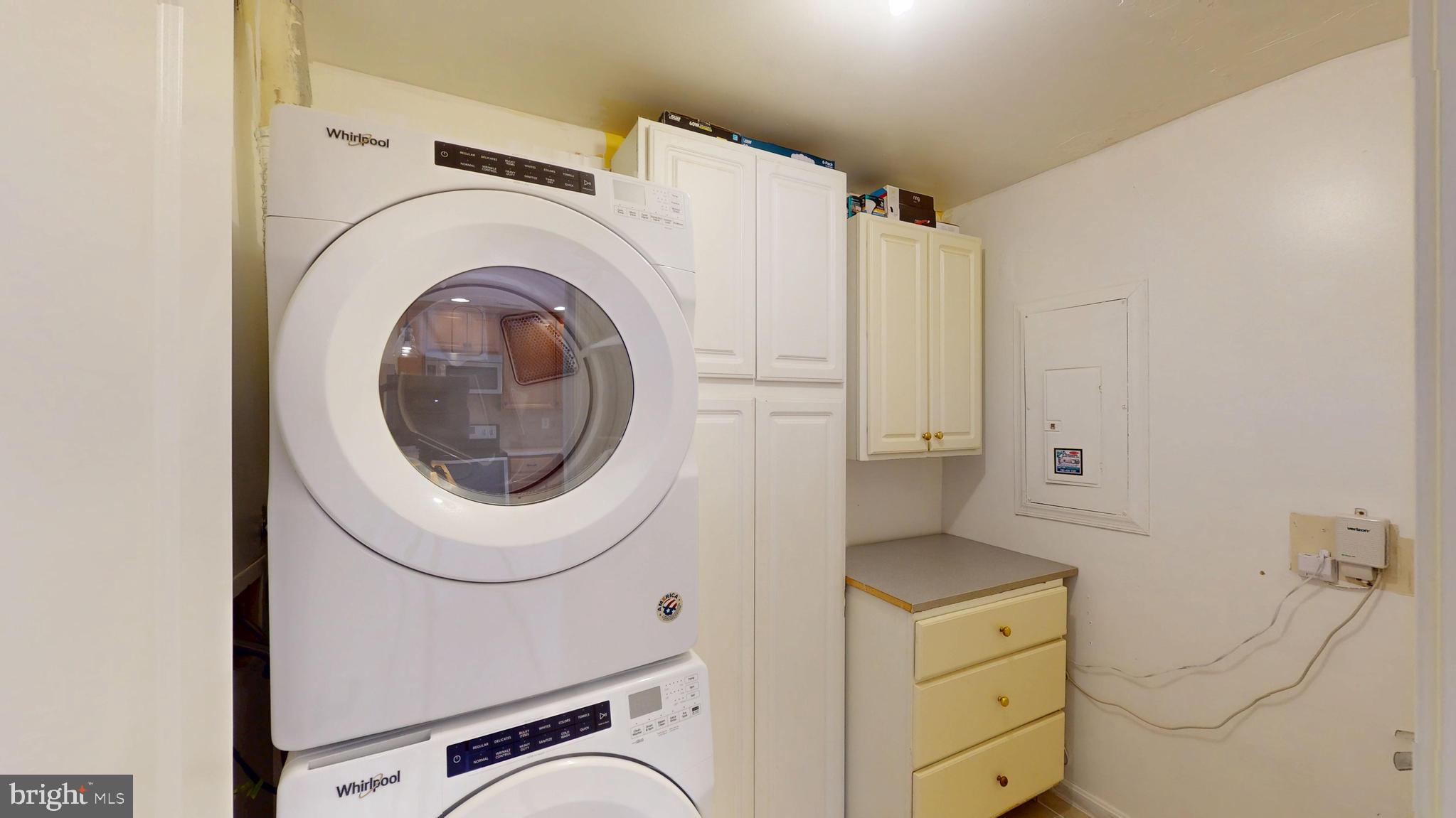 8576 Adamson Street Manassas, VA 20110 - Photo 12 of 25 a utility room with dryer and washer