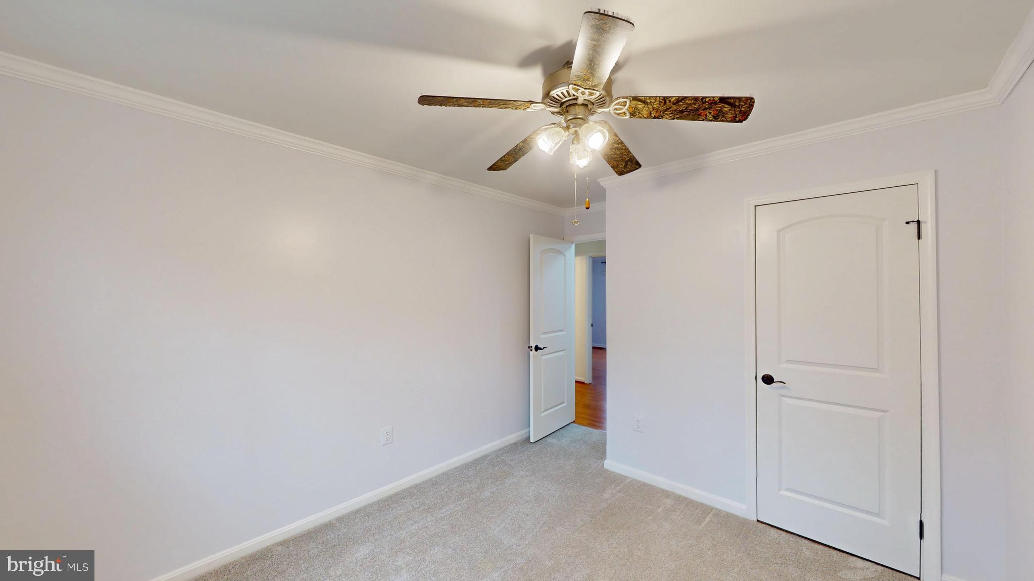 8576 Adamson Street Manassas, VA 20110 - Photo 18 of 25 wooden floor in an empty room