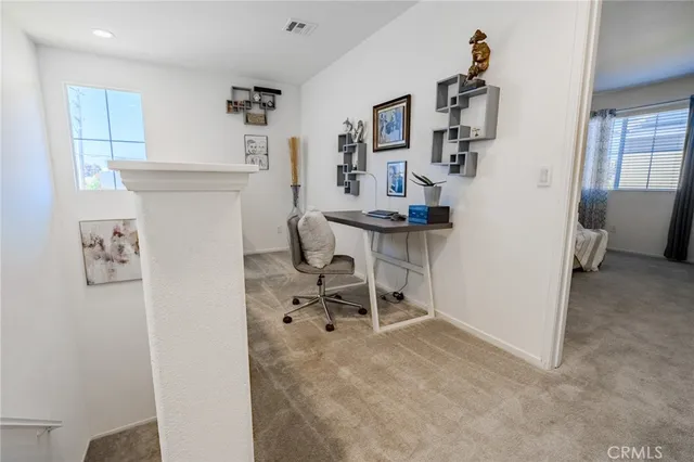 a bathroom with a granite countertop sink mirror and shower