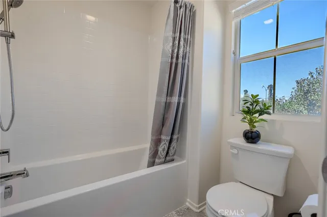 a view of a house with a yard porch and sitting area