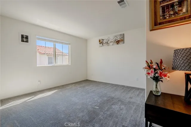 a view of a chairs and tables in patio