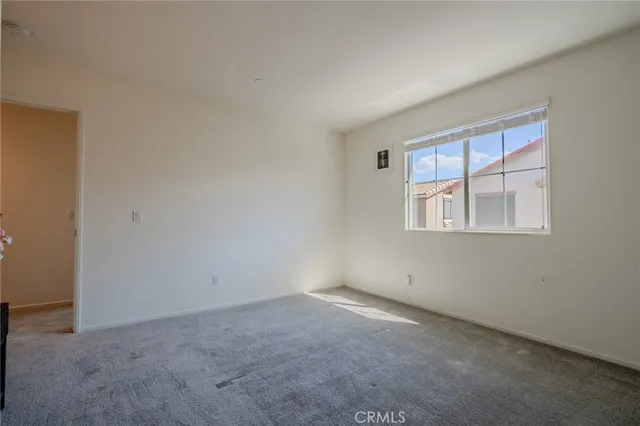 a view of house with outdoor space and swimming pool