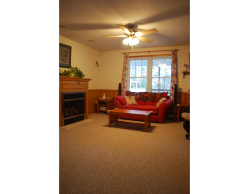86 Walkeen Koziol Road Warren, MA 01083 - Photo 8 of 11 a living room with furniture and a window