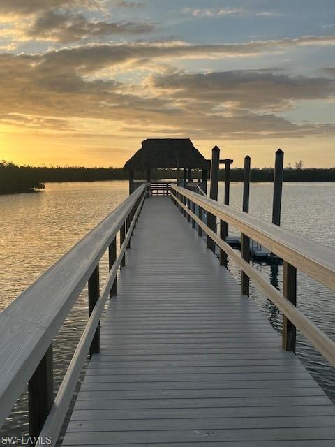 15455 Royal Fern Lane North, Unit 22B Naples, FL 34110 - Photo 37 of 37 Tiki hut at end of new boardwalk