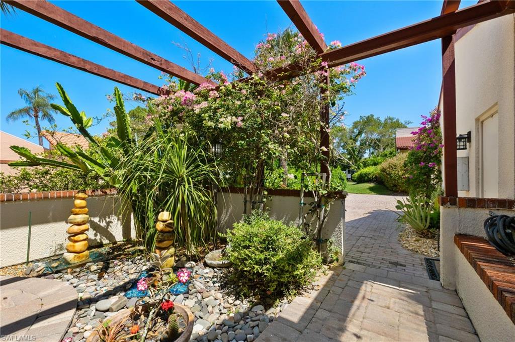 15455 Royal Fern Lane North, Unit 22B Naples, FL 34110 - Photo 8 of 37 Same patio looking to front