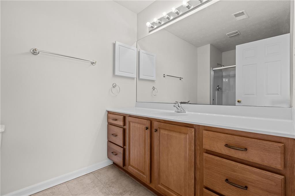 68 Nicholas Drive Beaver, PA 15009 - Photo 20 of 24 a bathroom with a sink and a mirror