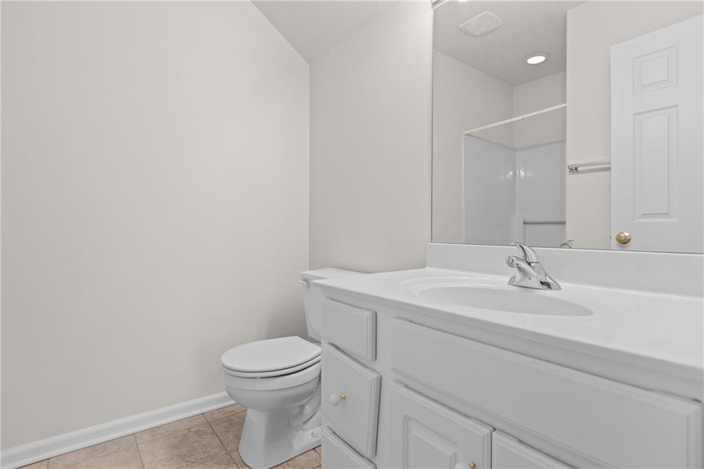 68 Nicholas Drive Beaver, PA 15009 - Photo 21 of 24 a bathroom with a sink a toilet and a mirror