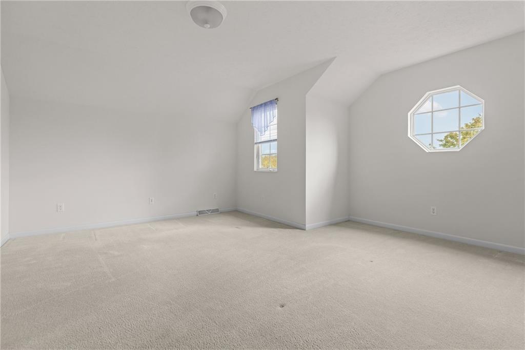 68 Nicholas Drive Beaver, PA 15009 - Photo 22 of 24 an empty room with windows and mirror