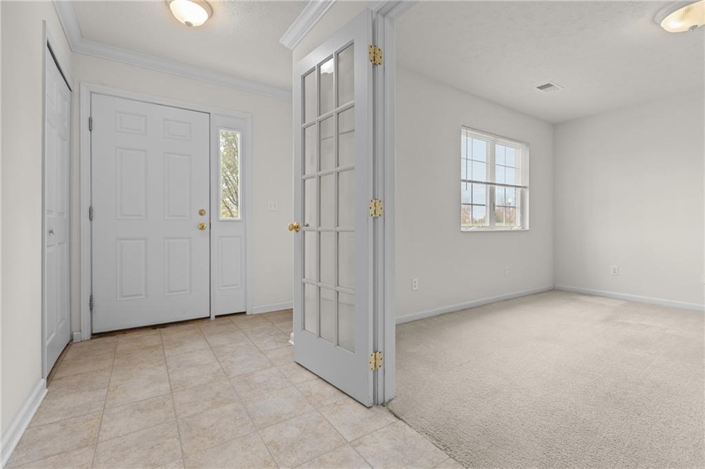 68 Nicholas Drive Beaver, PA 15009 - Photo 5 of 24 a view of an empty room with windows and closet