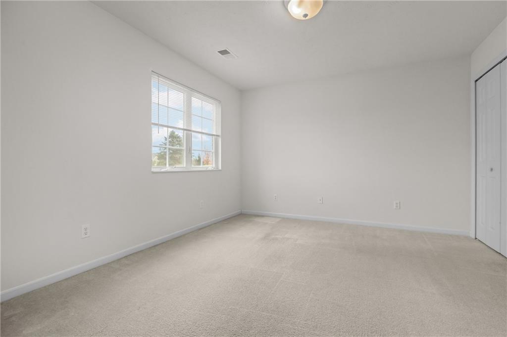 68 Nicholas Drive Beaver, PA 15009 - Photo 6 of 24 an empty room with windows