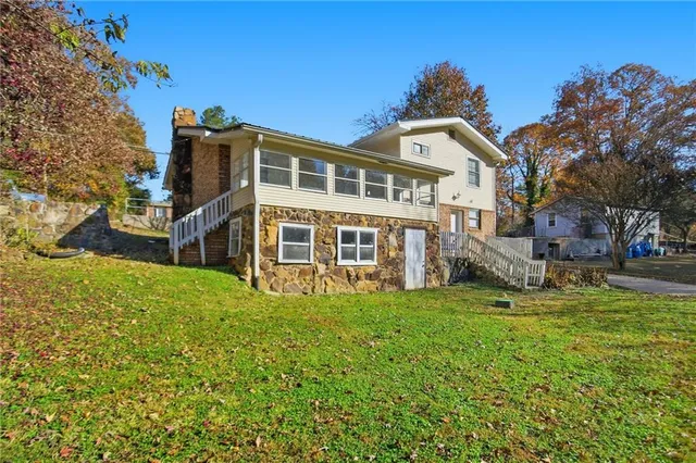 a house view with a garden space