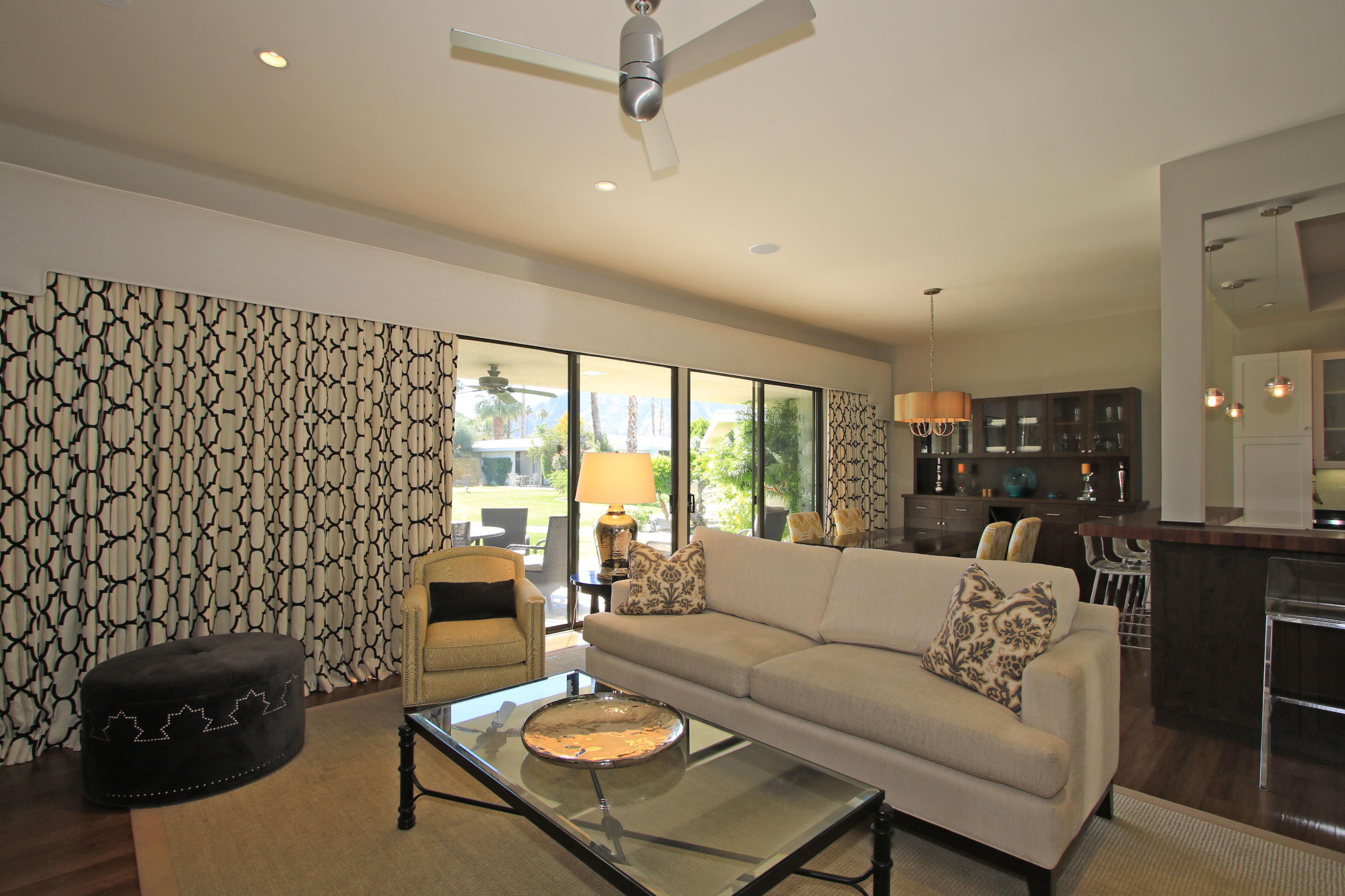 45760 Pawnee Road Indian Wells, CA 92210 - Photo 11 of 56 a living room with furniture and a table