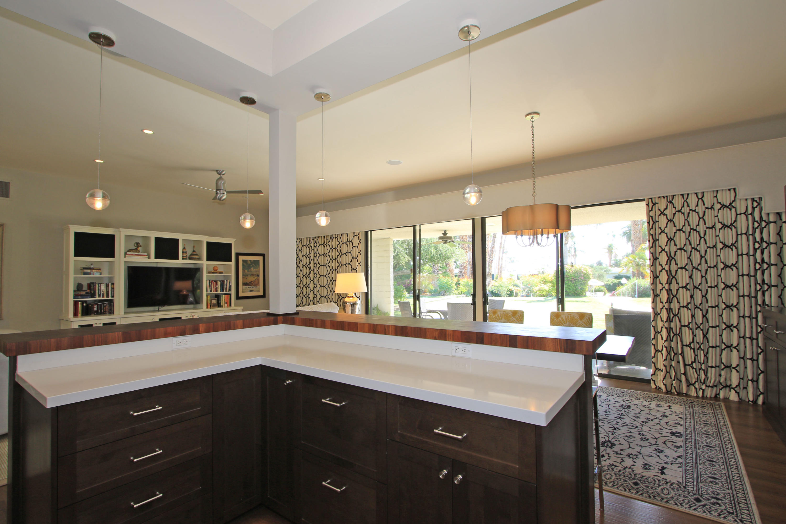 45760 Pawnee Road Indian Wells, CA 92210 - Photo 16 of 56 a kitchen with a sink and a large window