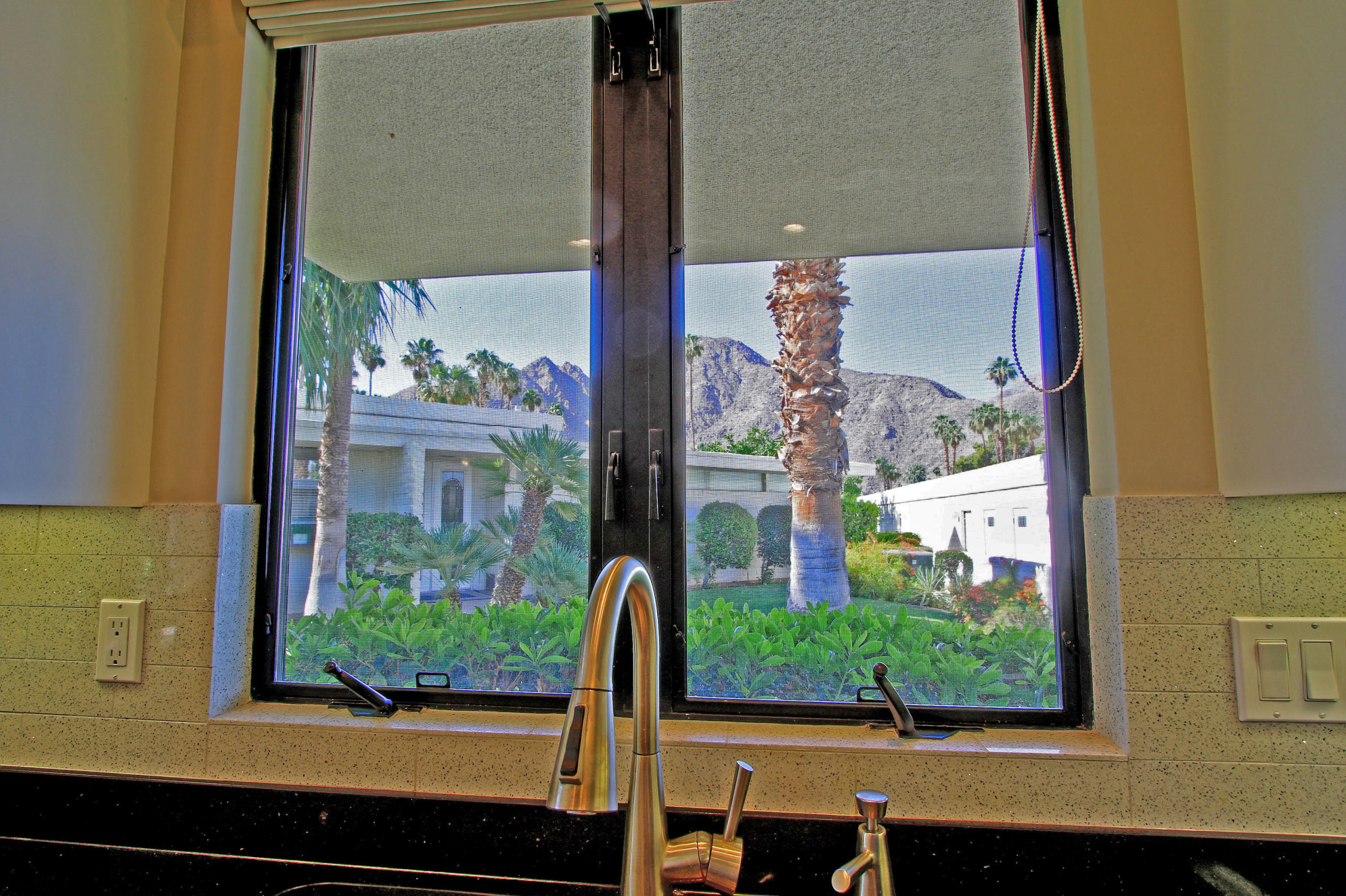 45760 Pawnee Road Indian Wells, CA 92210 - Photo 23 of 56 view of living room with a large window