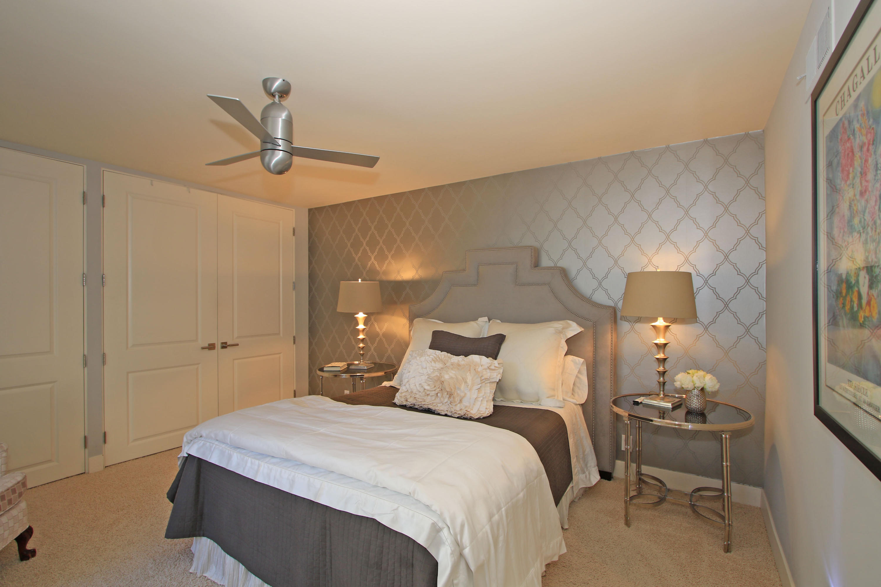 45760 Pawnee Road Indian Wells, CA 92210 - Photo 30 of 56 a bedroom with a bed and a lamp