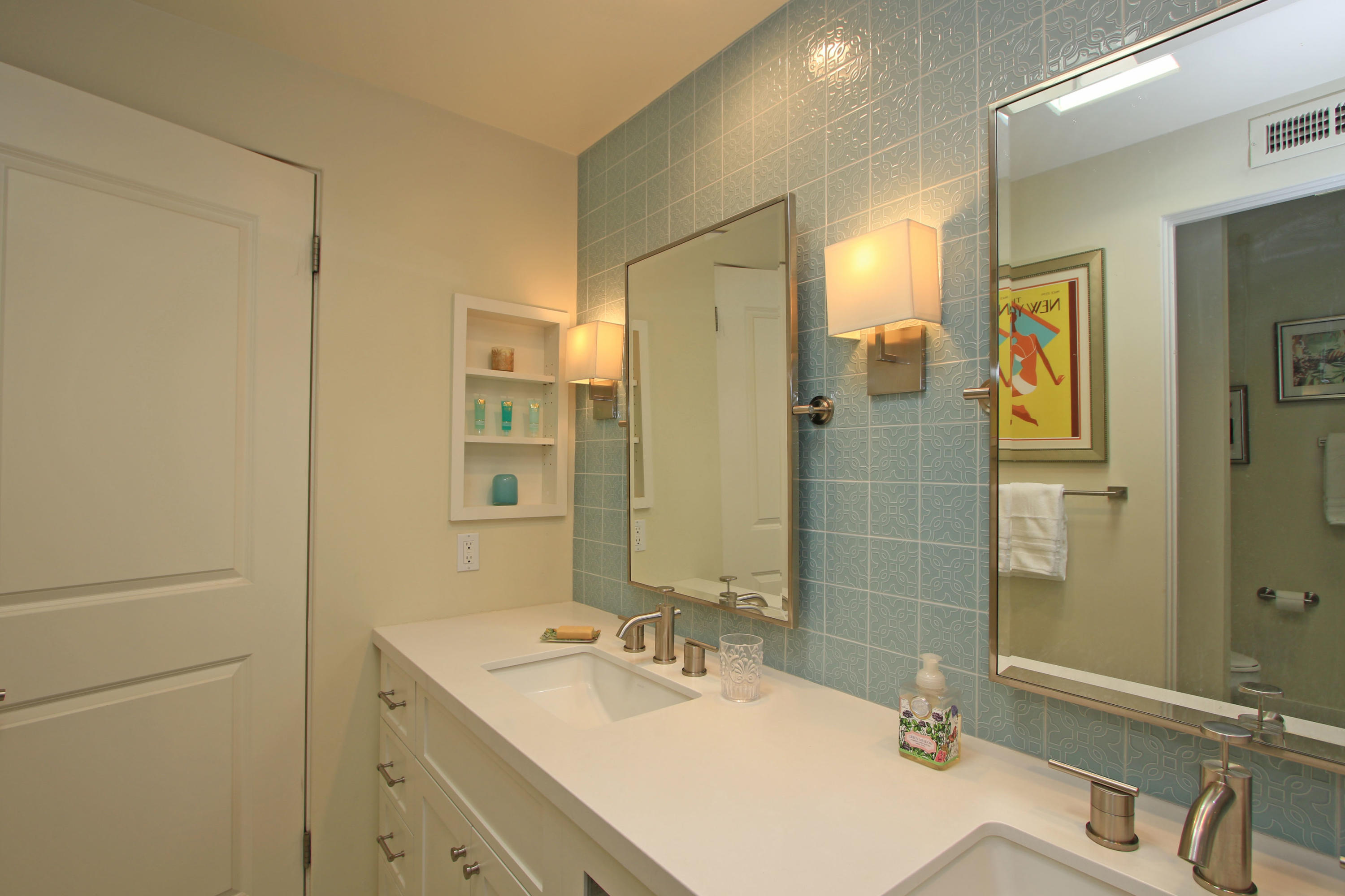 45760 Pawnee Road Indian Wells, CA 92210 - Photo 32 of 56 a bathroom with a sink and a mirror