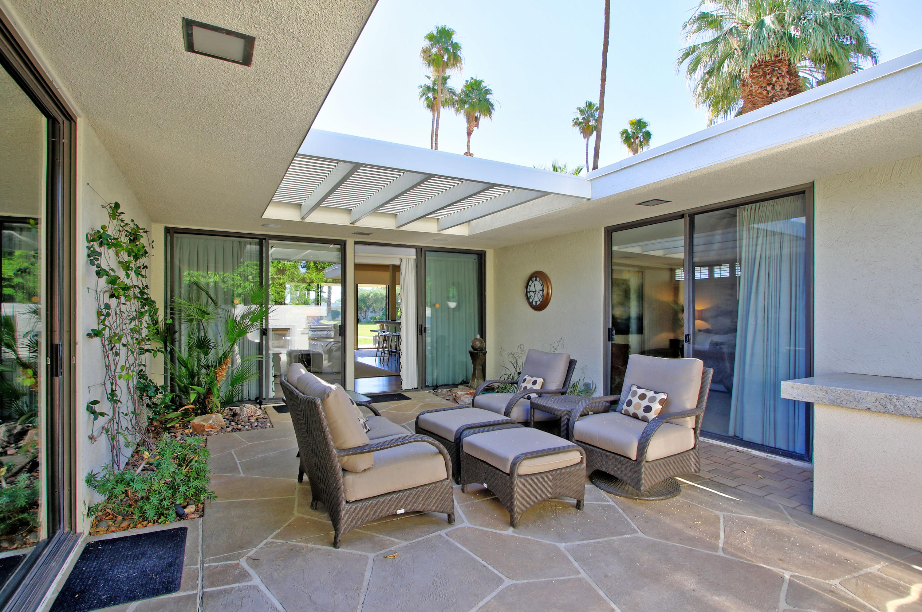 45760 Pawnee Road Indian Wells, CA 92210 - Photo 41 of 56 a outdoor living space with furniture