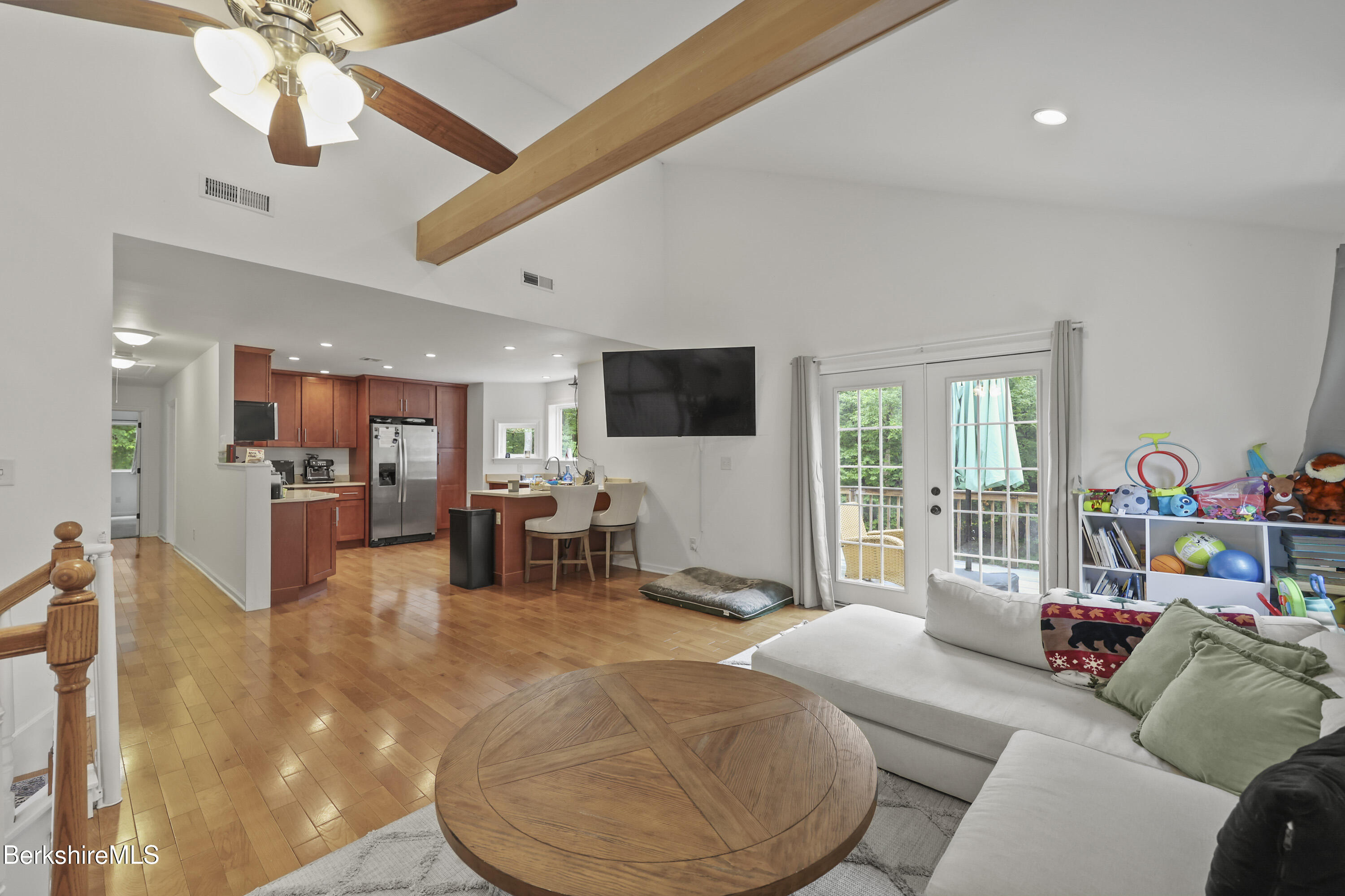 674 Benton Hill Road Becket, MA 01223 - Photo 11 of 61 a living room with furniture and a flat screen tv