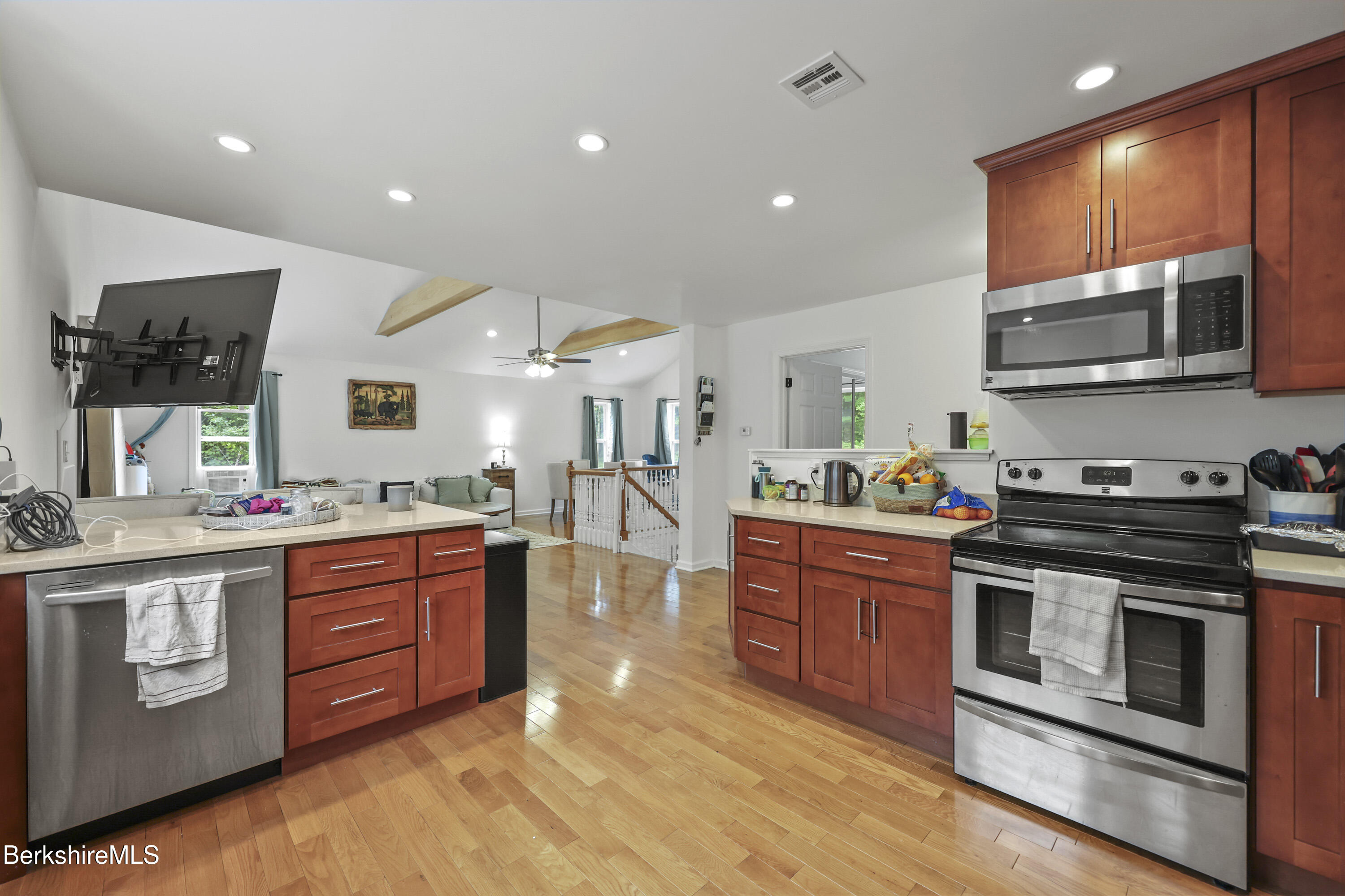674 Benton Hill Road Becket, MA 01223 - Photo 20 of 61 a kitchen with stainless steel appliances granite countertop a stove and a sink