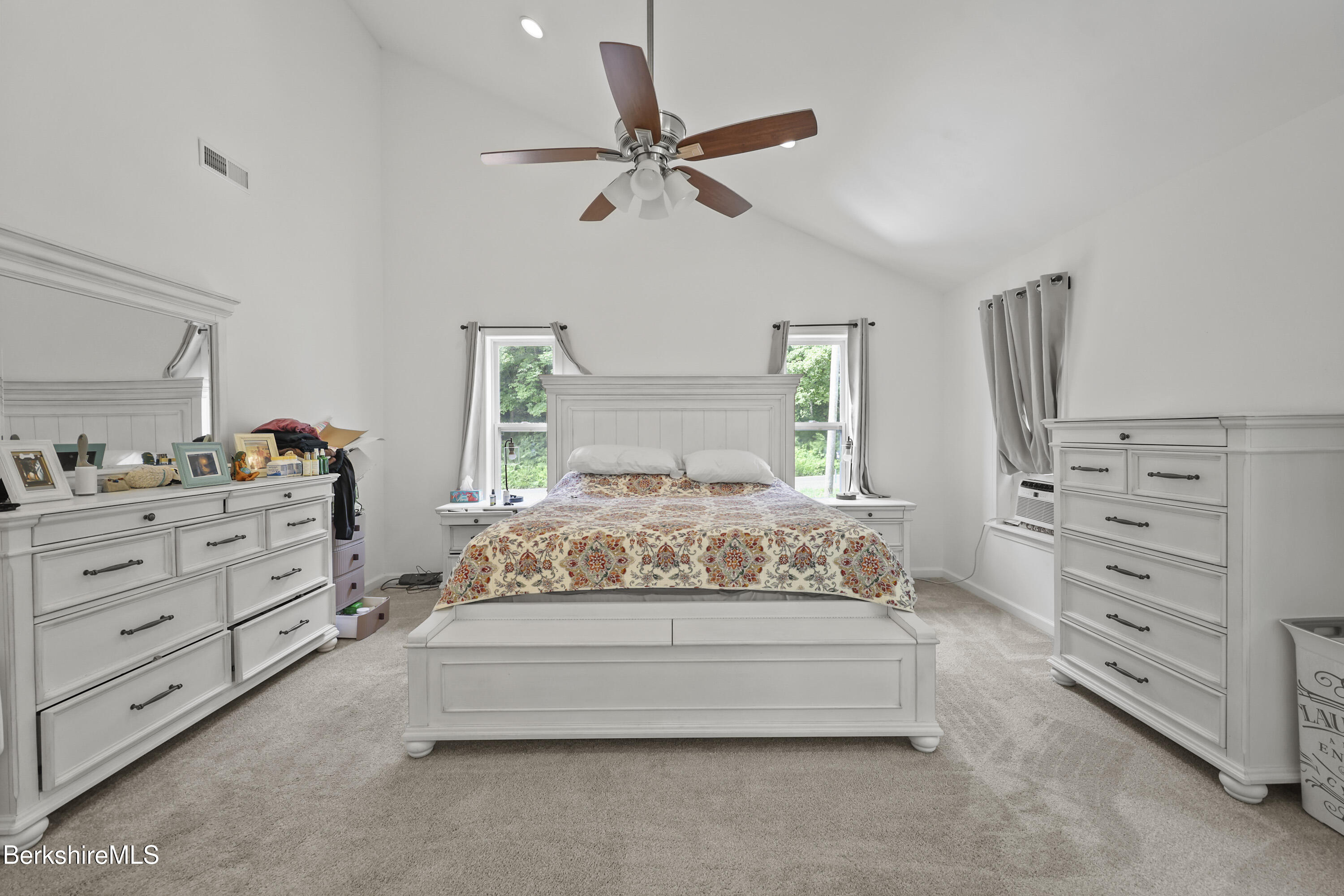 674 Benton Hill Road Becket, MA 01223 - Photo 25 of 61 a bedroom with a bed and dresser