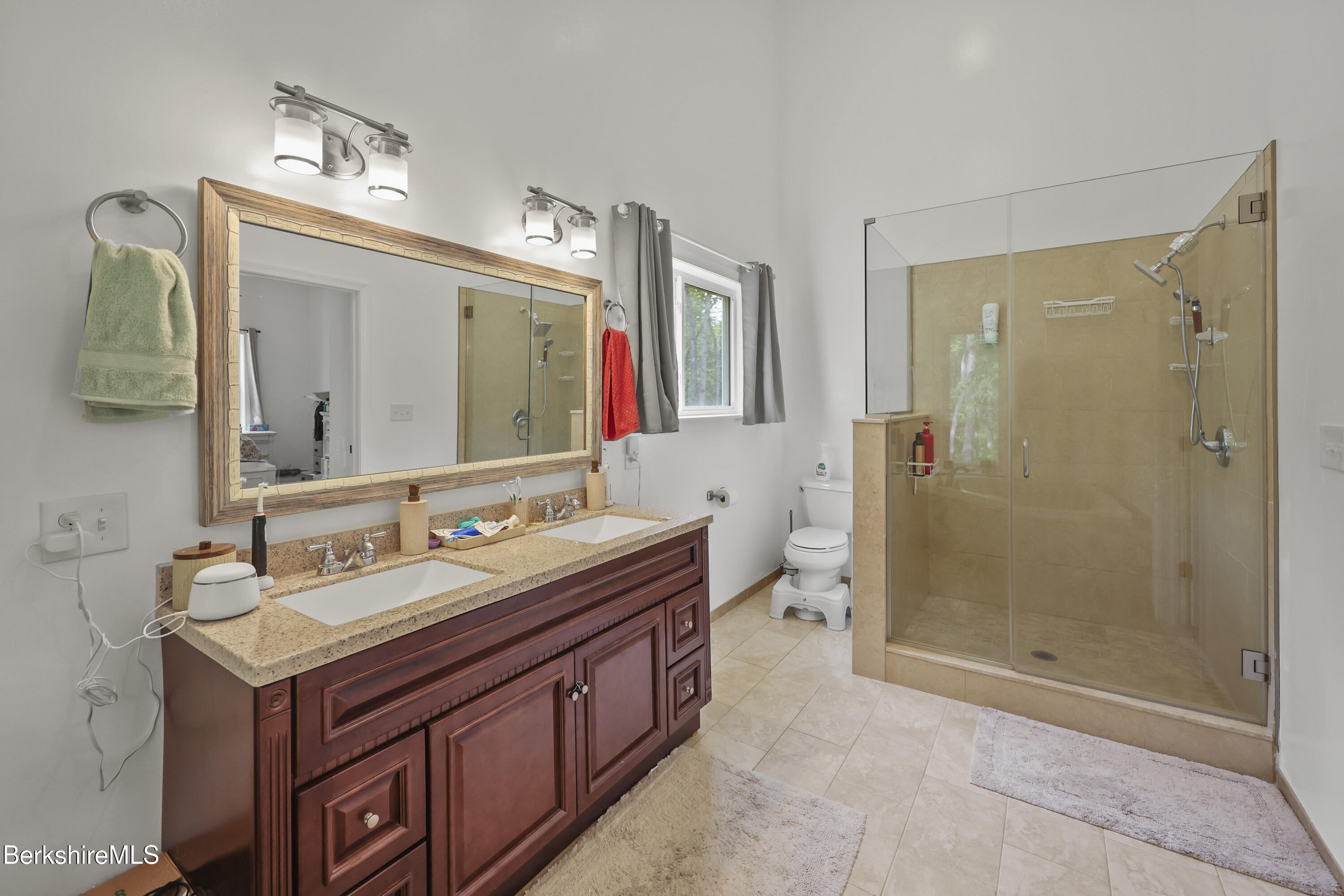 674 Benton Hill Road Becket, MA 01223 - Photo 29 of 61 a bathroom with a double vanity sink mirror and shower