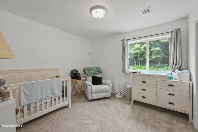 a view of a chair and table in the balcony