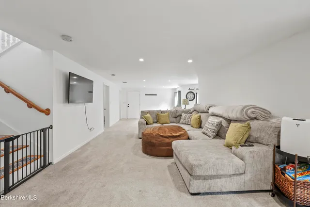 a bedroom with a bed and a walk in closet