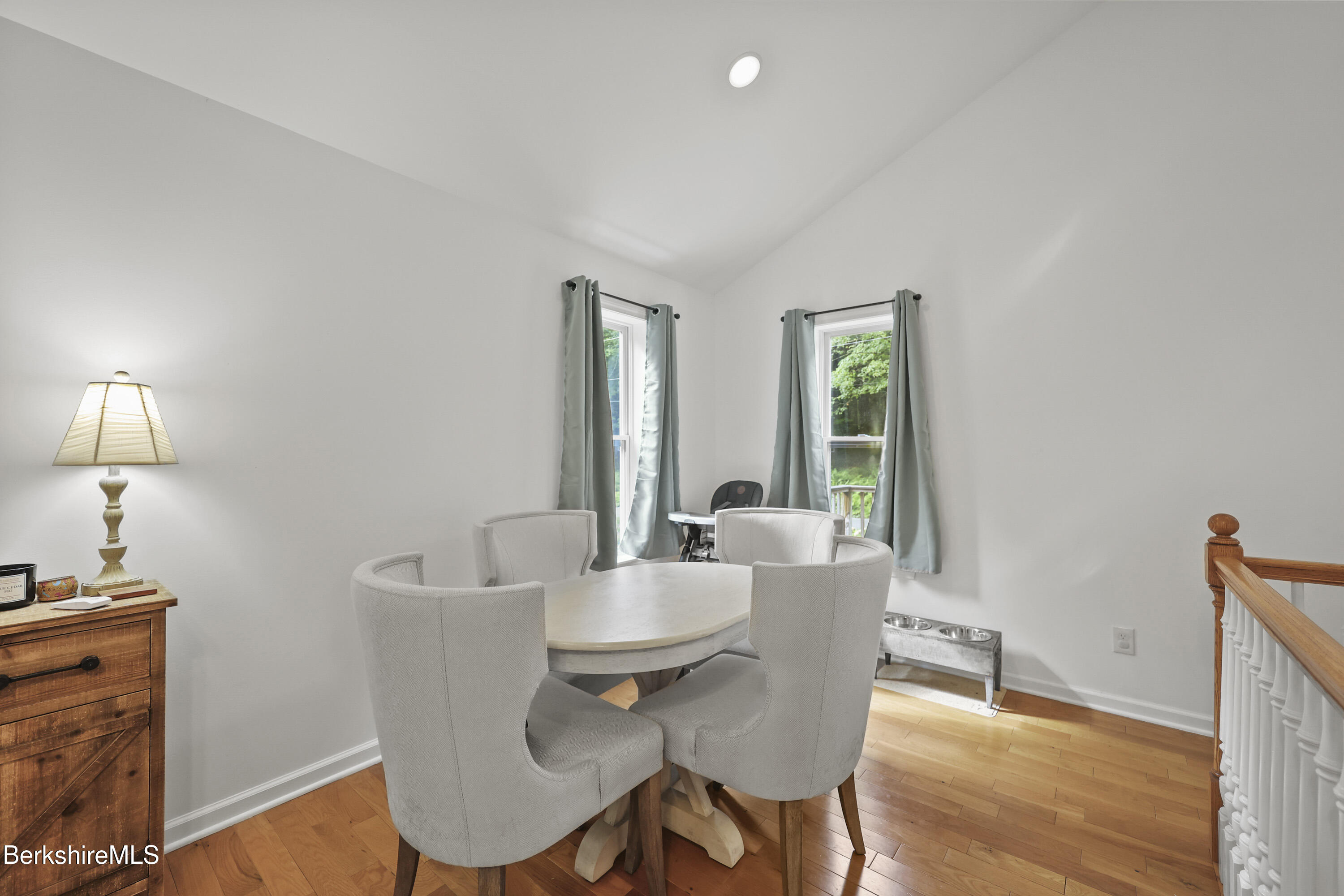 674 Benton Hill Road Becket, MA 01223 - Photo 9 of 61 a view of a dining room with furniture window and wooden floor