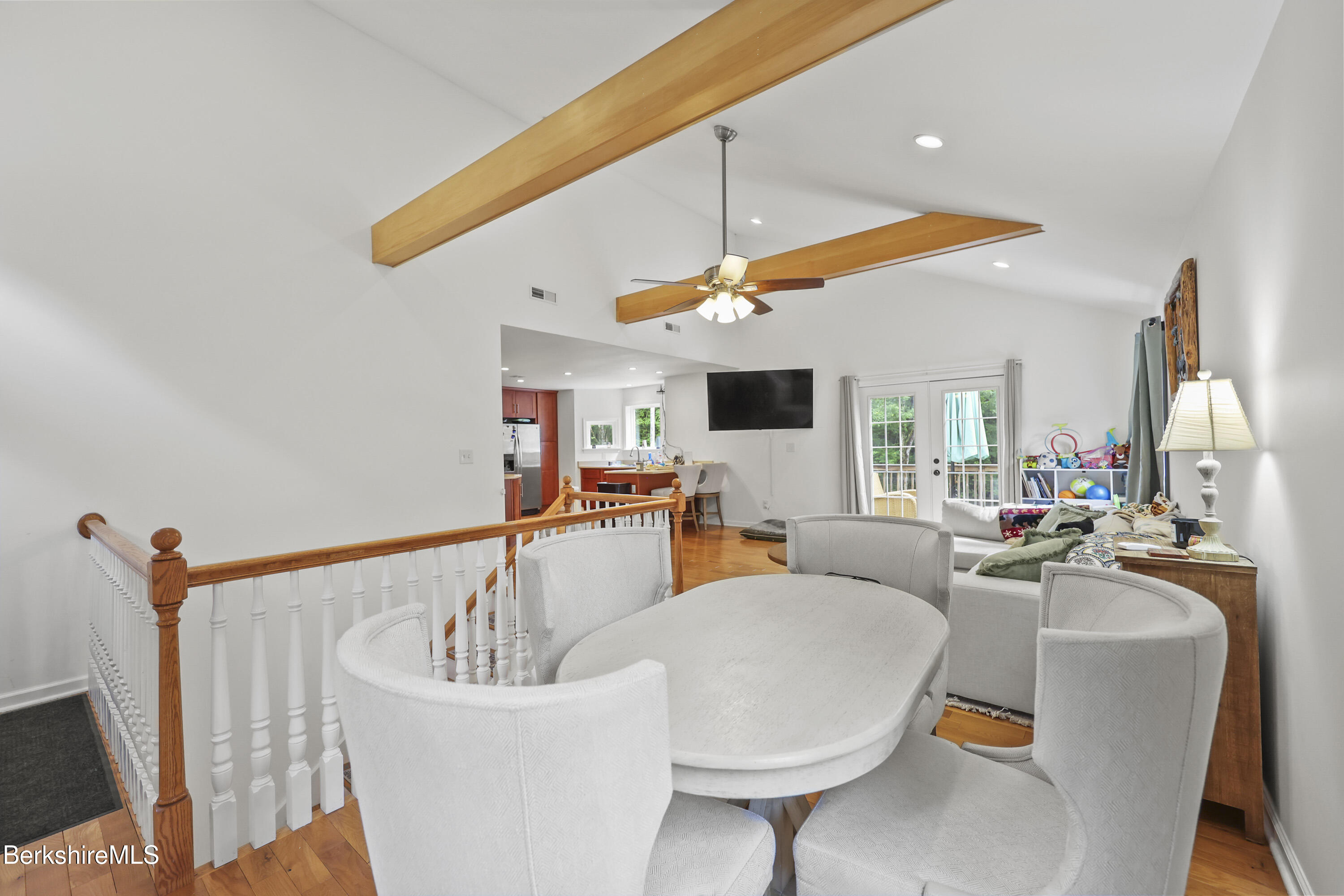 674 Benton Hill Road Becket, MA 01223 - Photo 10 of 61 a living room with furniture kitchen view and a large mirror