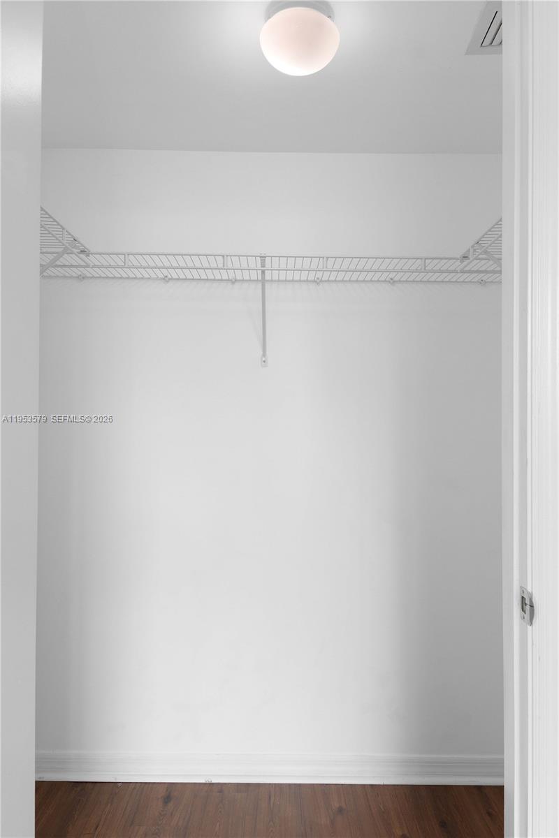 55 Southeast 6th Street, Unit 2606 Miami, FL 33131 - Photo 12 of 18 a view of a closet