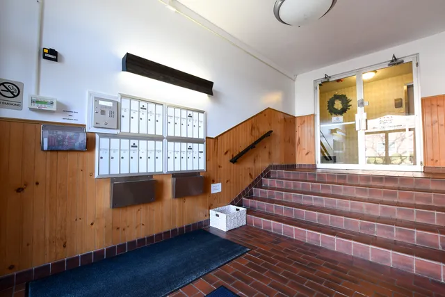 a view of a bathroom with a glass door