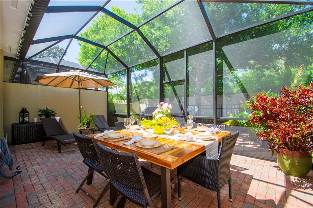 1915 Bridgepointe Circle, Unit 41 Vero Beach, FL 32967 - Photo 2 of 36 a view of an outdoor sitting area with furniture