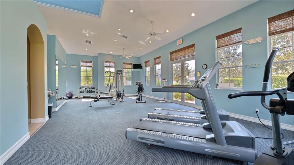 1915 Bridgepointe Circle, Unit 41 Vero Beach, FL 32967 - Photo 30 of 36 a lobby with furniture and a large window