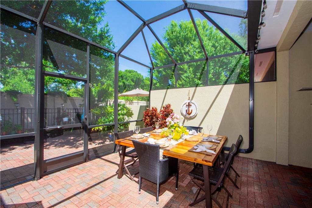1915 Bridgepointe Circle, Unit 41 Vero Beach, FL 32967 - Photo 3 of 36 a view of an outdoor sitting area with furniture