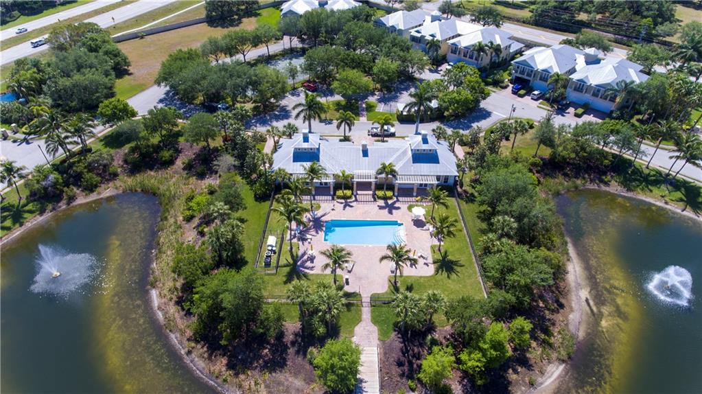 1915 Bridgepointe Circle, Unit 41 Vero Beach, FL 32967 - Photo 36 of 36 an aerial view of residential house with outdoor space and lake view