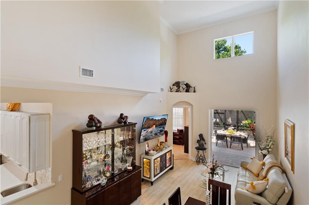 1915 Bridgepointe Circle, Unit 41 Vero Beach, FL 32967 - Photo 7 of 36 a view of a room with workspace and a window