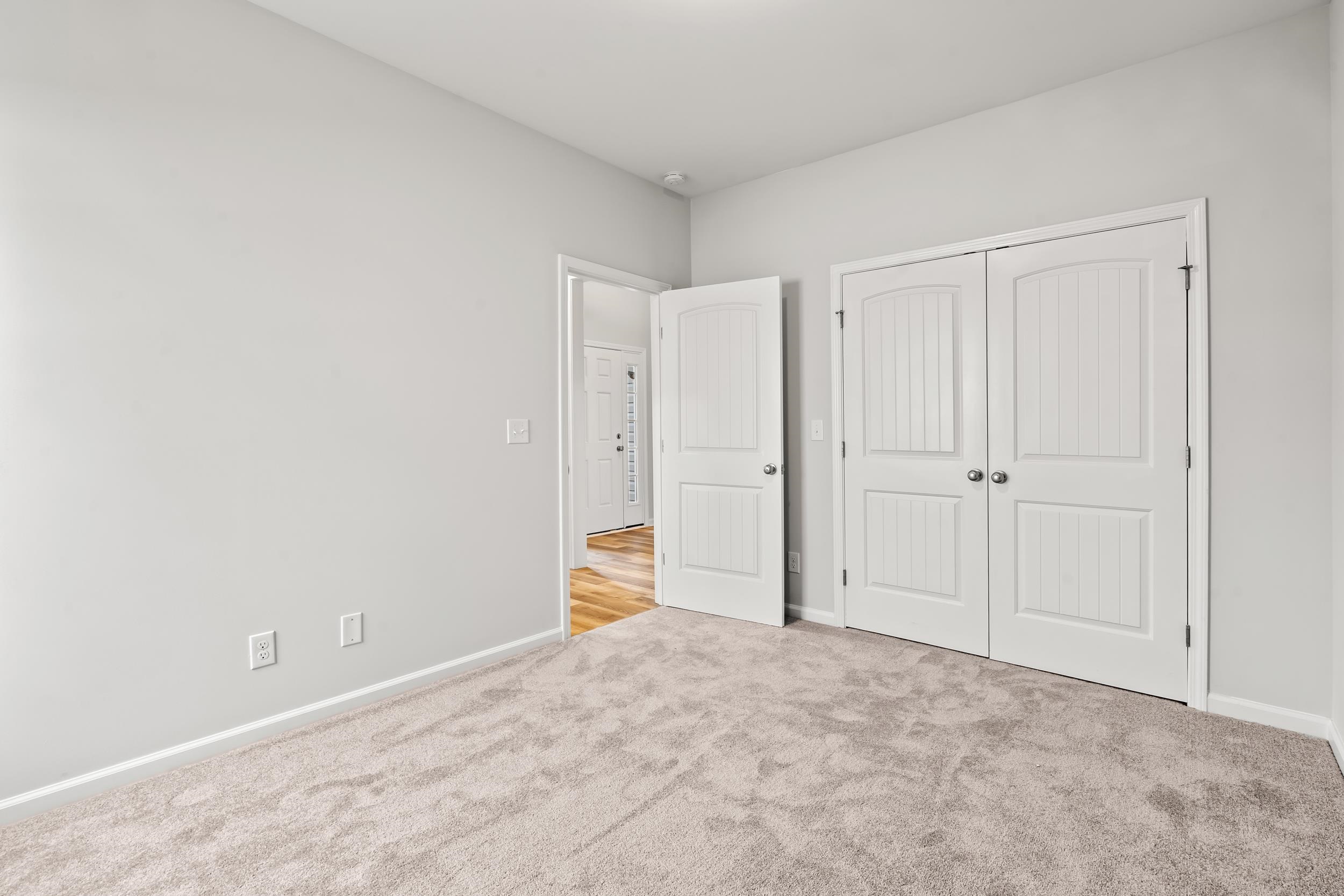 231 Stillbrook Drive Longs, SC 29568 - Photo 12 of 38 Unfurnished bedroom featuring carpet and a closet