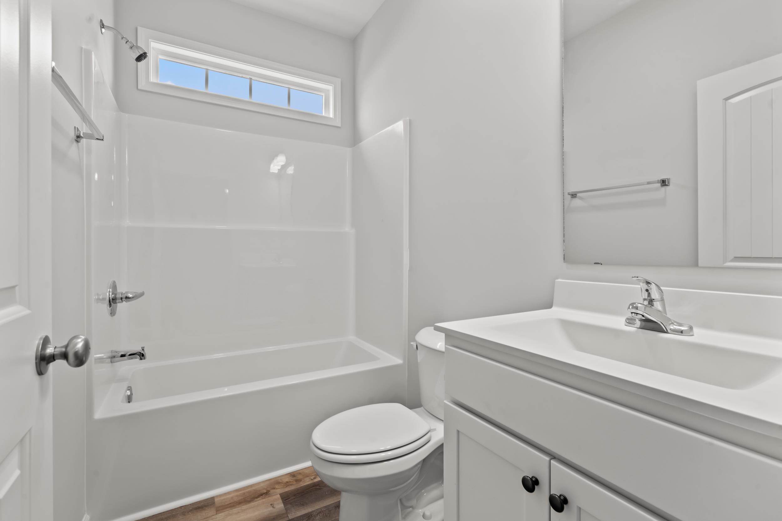 231 Stillbrook Drive Longs, SC 29568 - Photo 10 of 38 Full bath with vanity, bathing tub / shower combination, and wood finished floors