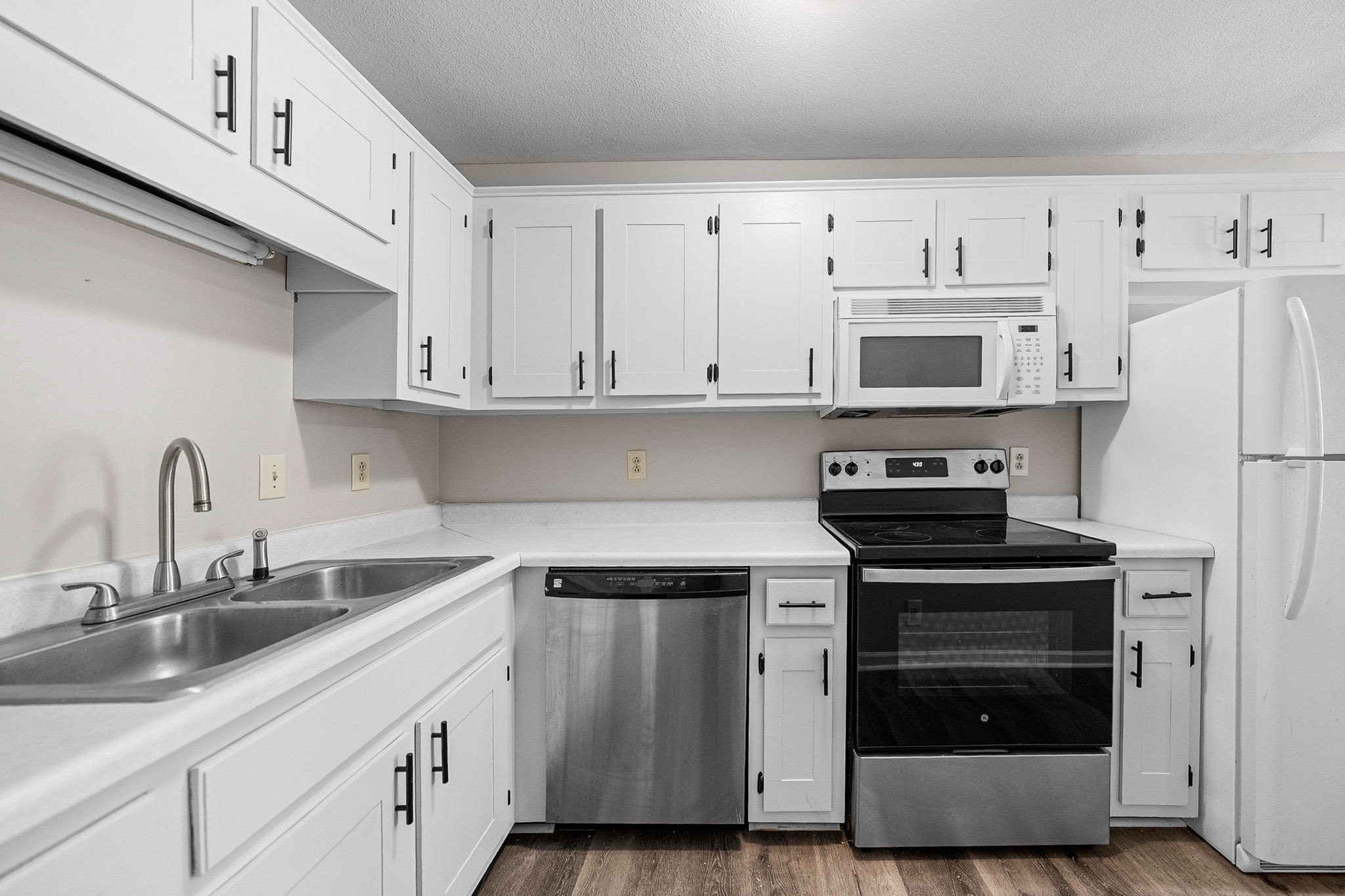1539 Hugh Hunter Road Oak Grove, KY 42262 - Photo 12 of 22 a kitchen with cabinets appliances and a sink