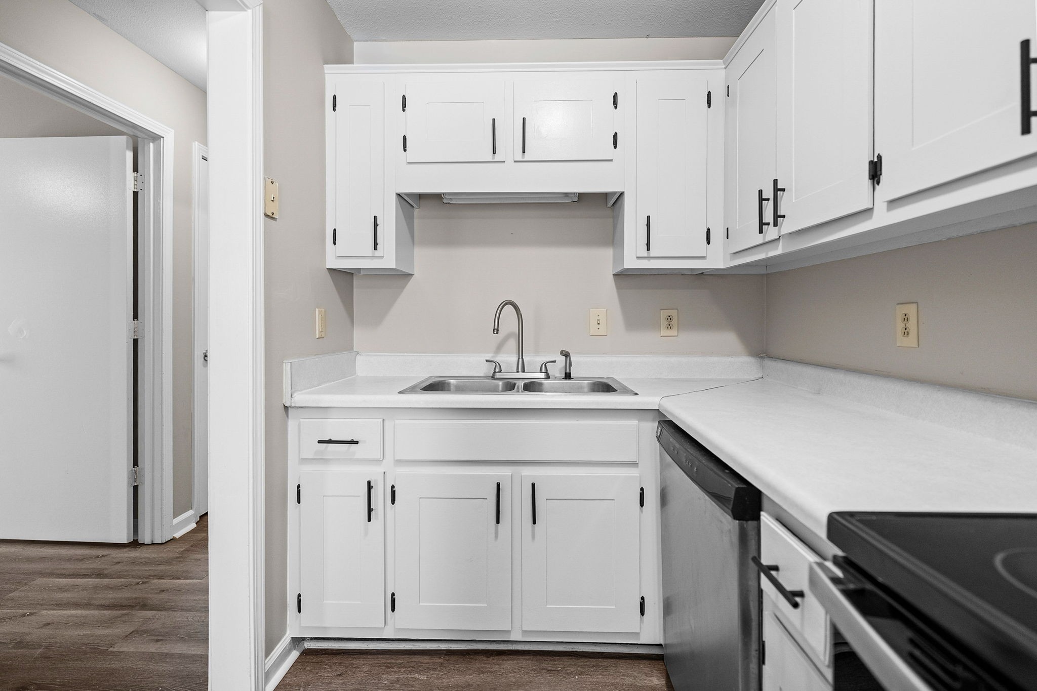 1539 Hugh Hunter Road Oak Grove, KY 42262 - Photo 13 of 22 a kitchen with white cabinets and appliances