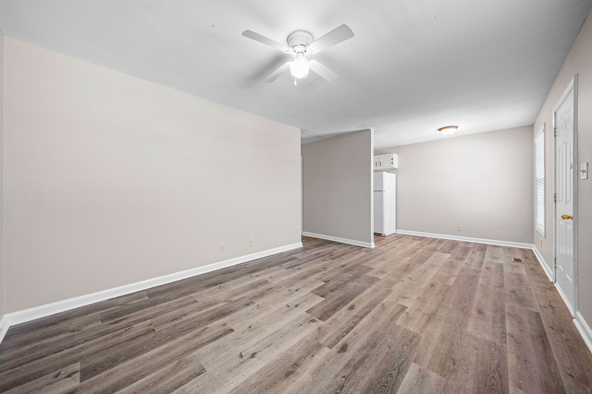 1539 Hugh Hunter Road Oak Grove, KY 42262 - Photo 5 of 22 a view of an empty room with wooden floor