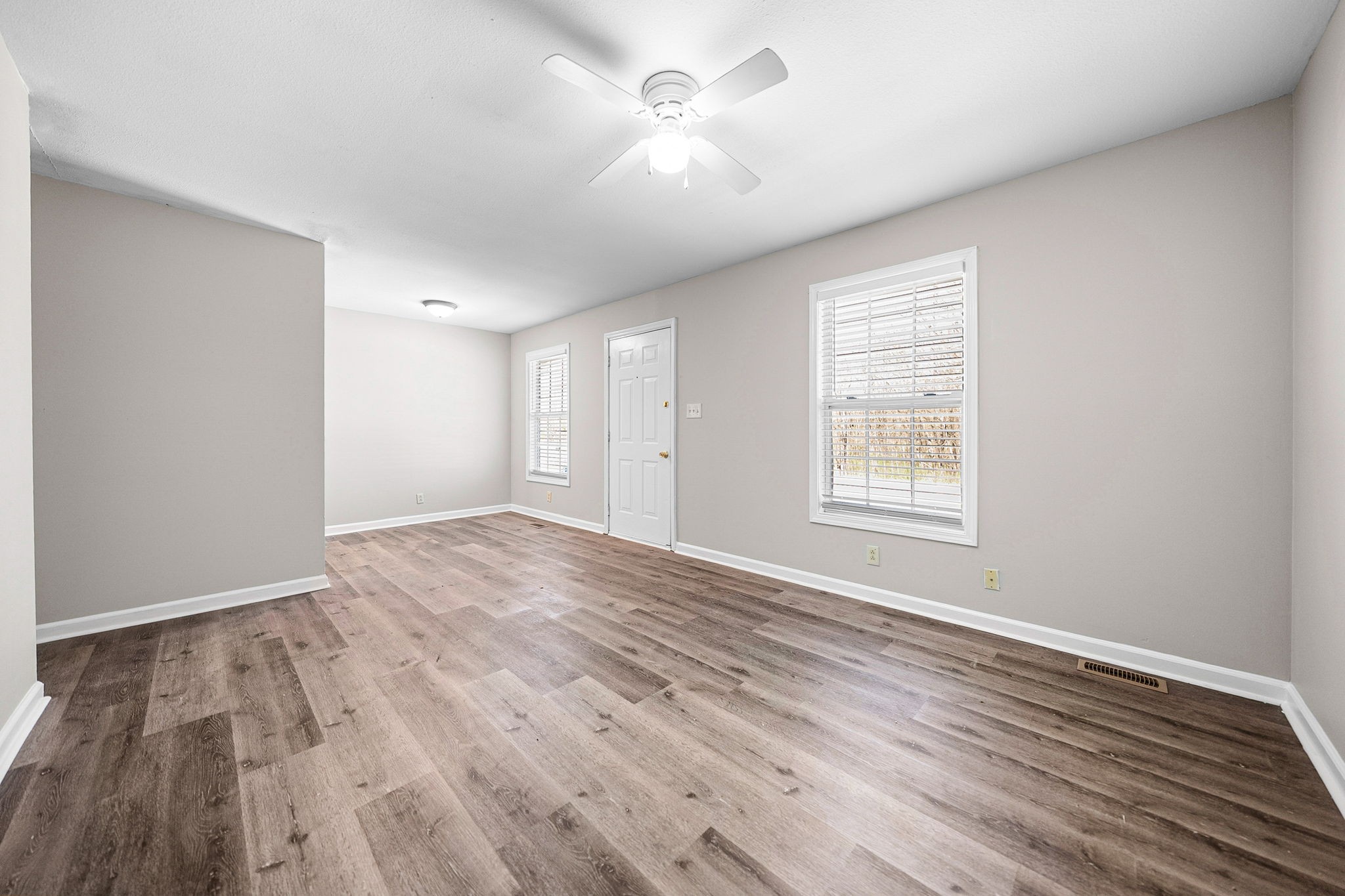 1539 Hugh Hunter Road Oak Grove, KY 42262 - Photo 6 of 22 wooden floor in an empty room with a window