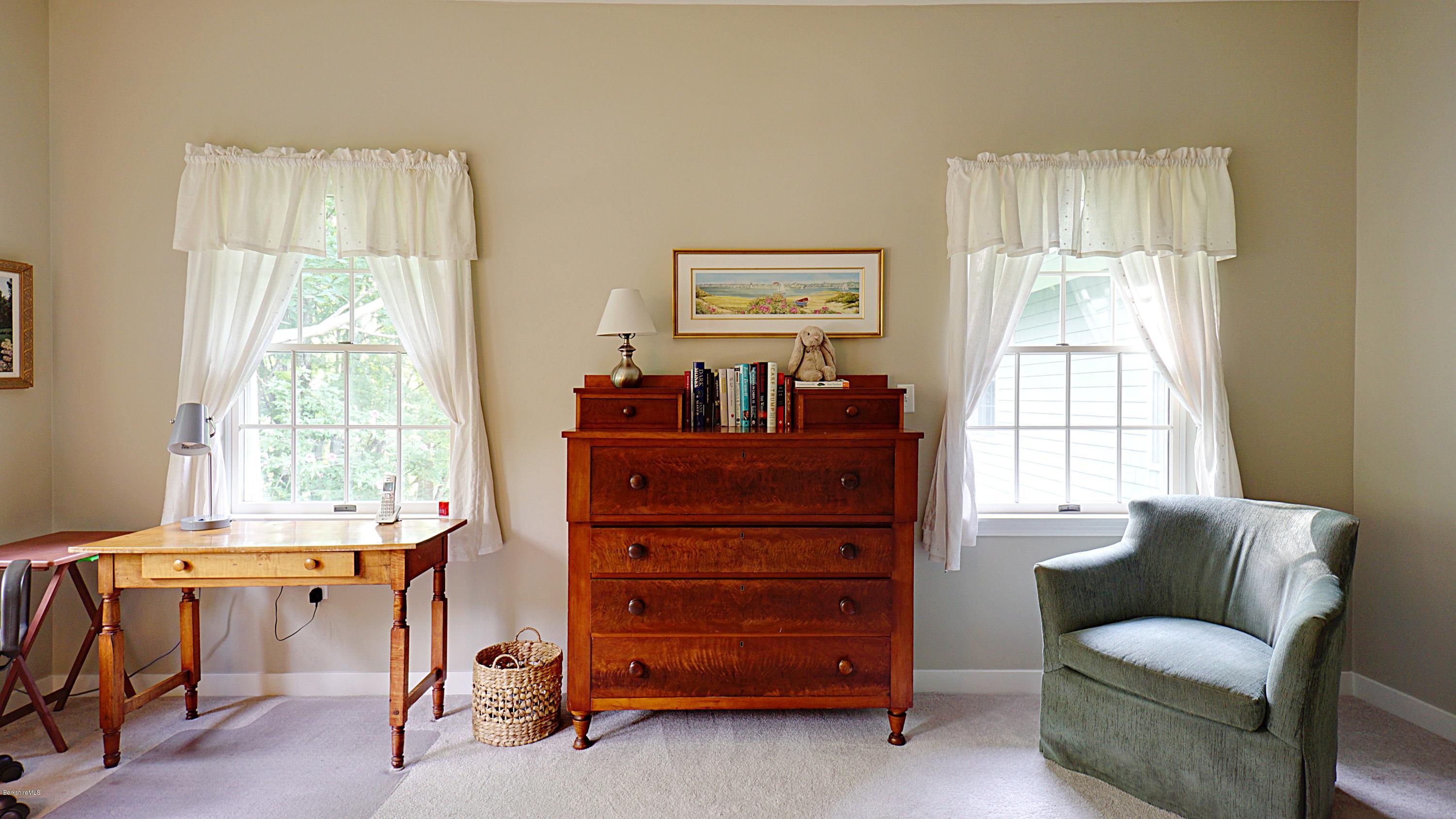 11 Prospect Hill Road, Unit 3 Stockbridge, MA 01262 - Photo 12 of 27 a room with a bed and a window