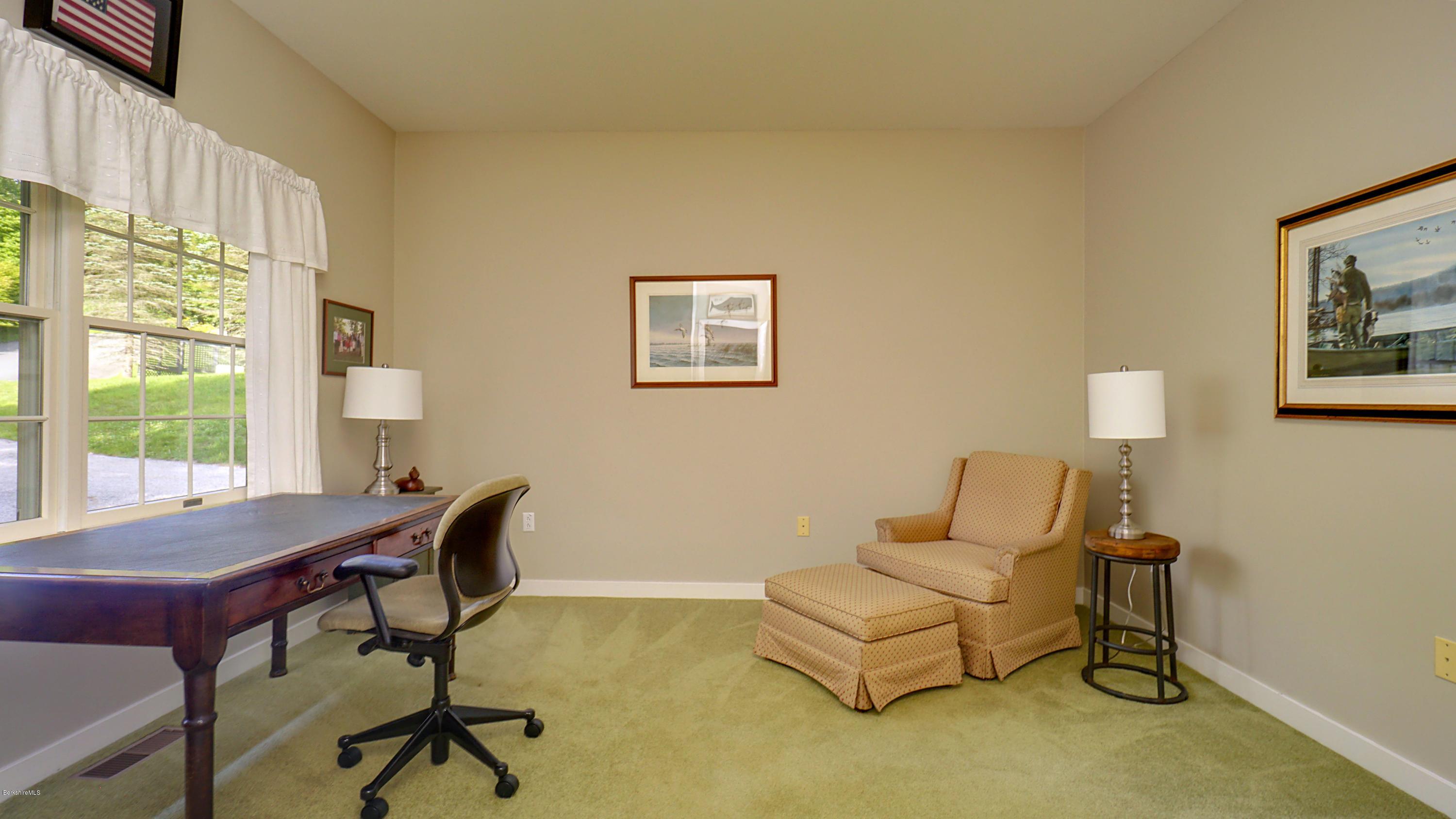 11 Prospect Hill Road, Unit 3 Stockbridge, MA 01262 - Photo 15 of 27 a living room with furniture and a window