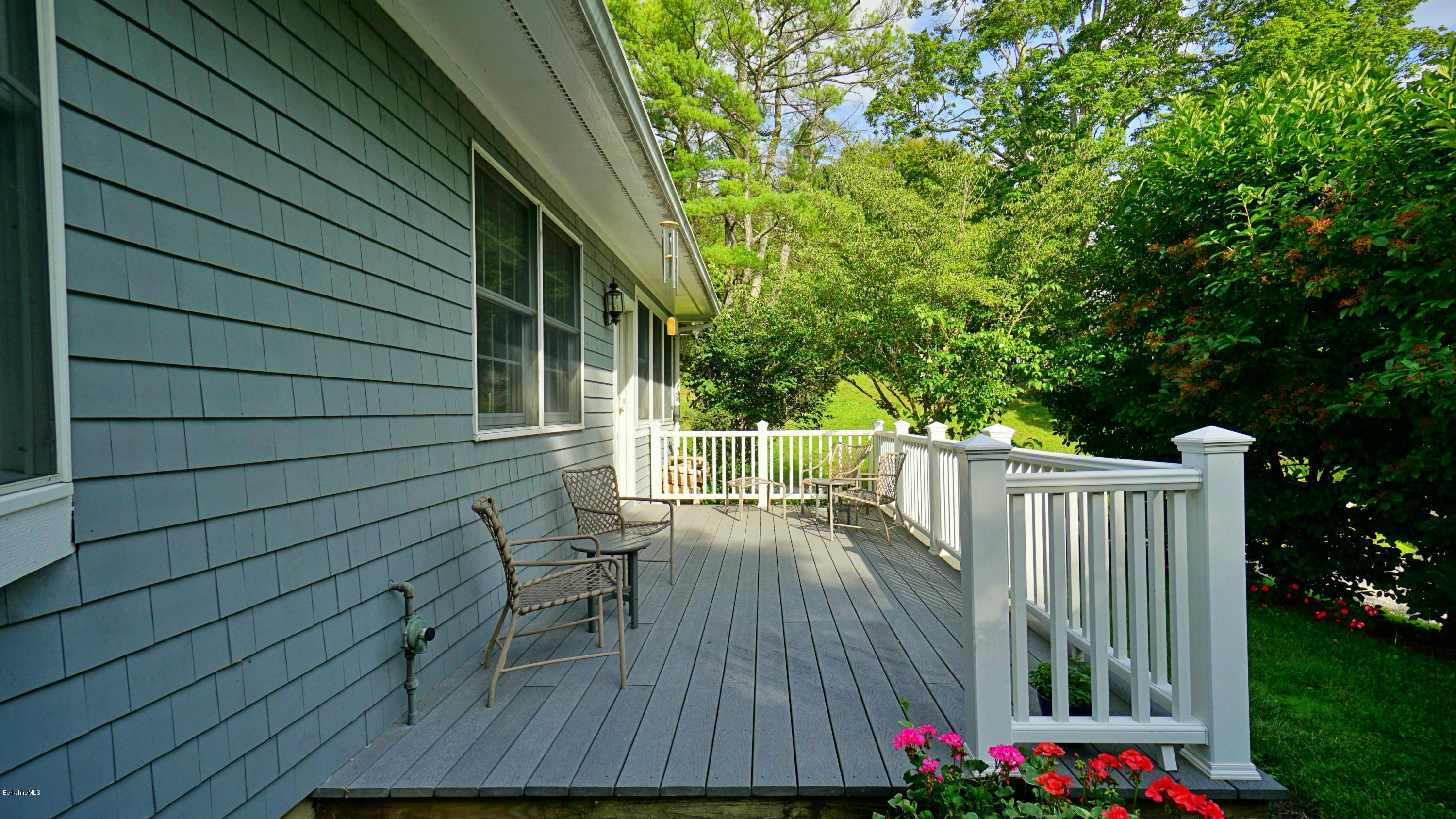 11 Prospect Hill Road, Unit 3 Stockbridge, MA 01262 - Photo 17 of 27 a view of balcony with deck and outdoor seating