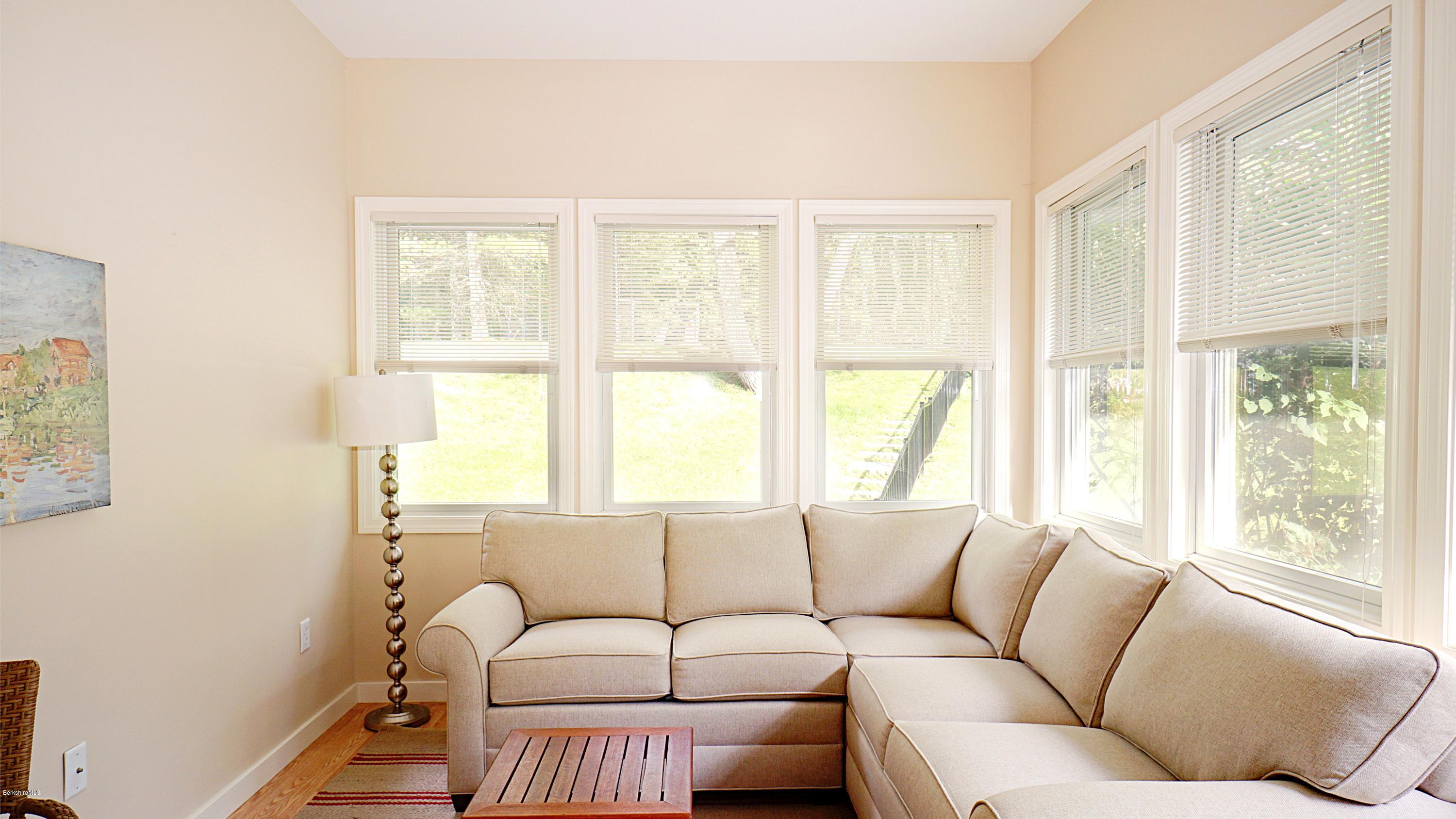 11 Prospect Hill Road, Unit 3 Stockbridge, MA 01262 - Photo 9 of 27 a living room with furniture and windows