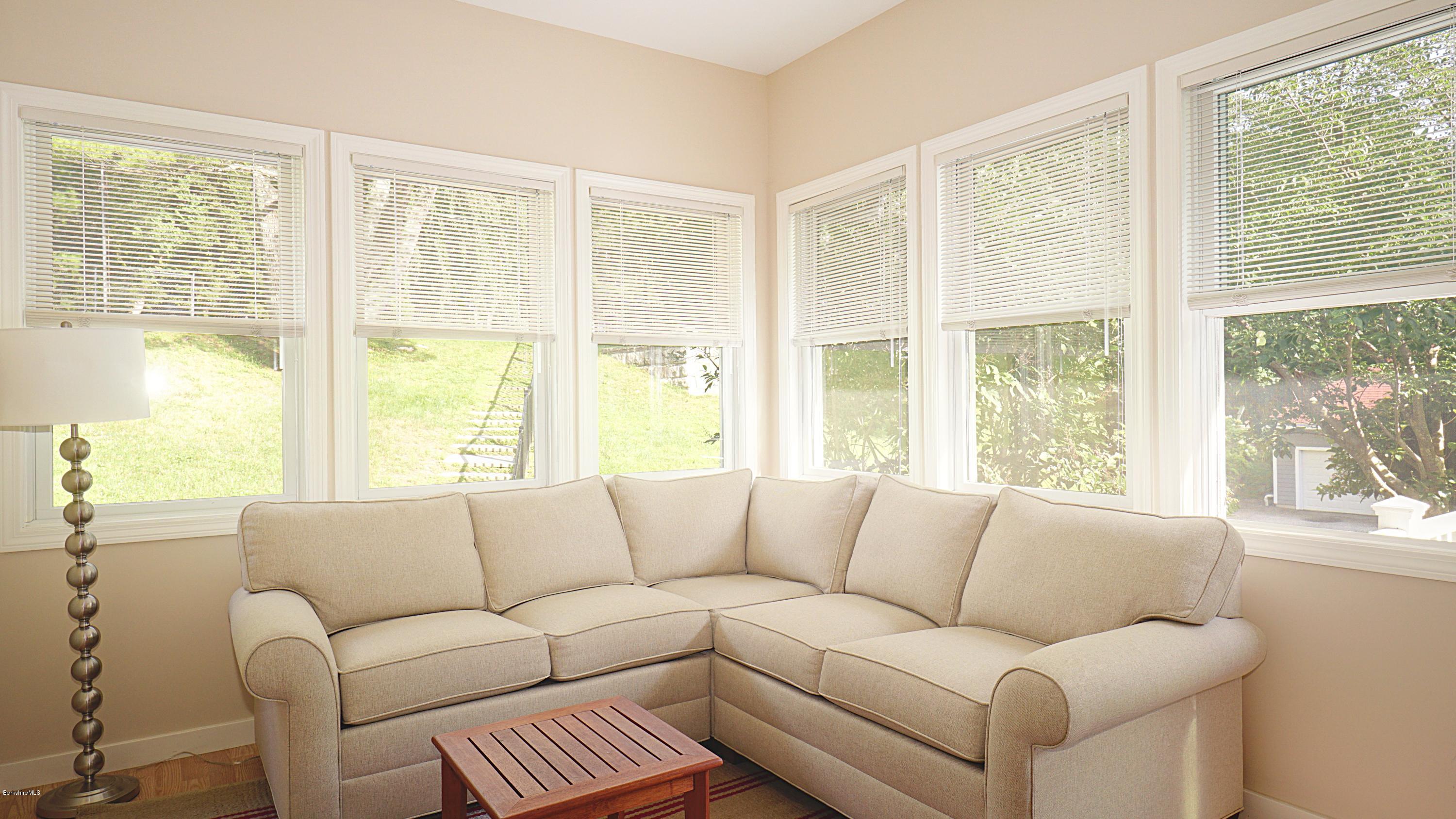 11 Prospect Hill Road, Unit 3 Stockbridge, MA 01262 - Photo 10 of 27 a living room with furniture and a large window