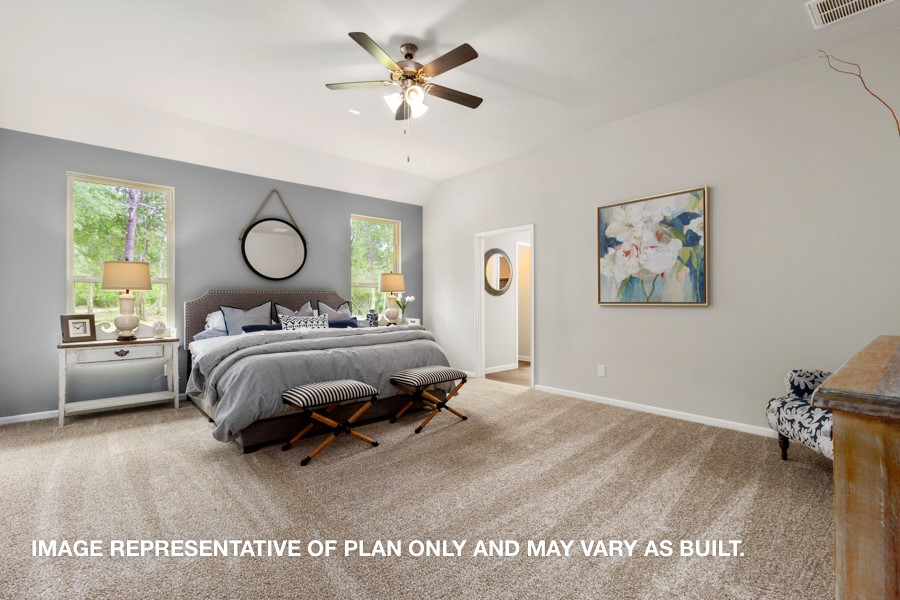 1421 Imperial Ranch Way Dayton, TX 77535 - Photo 6 of 19 a bedroom with a bed dresser and a window