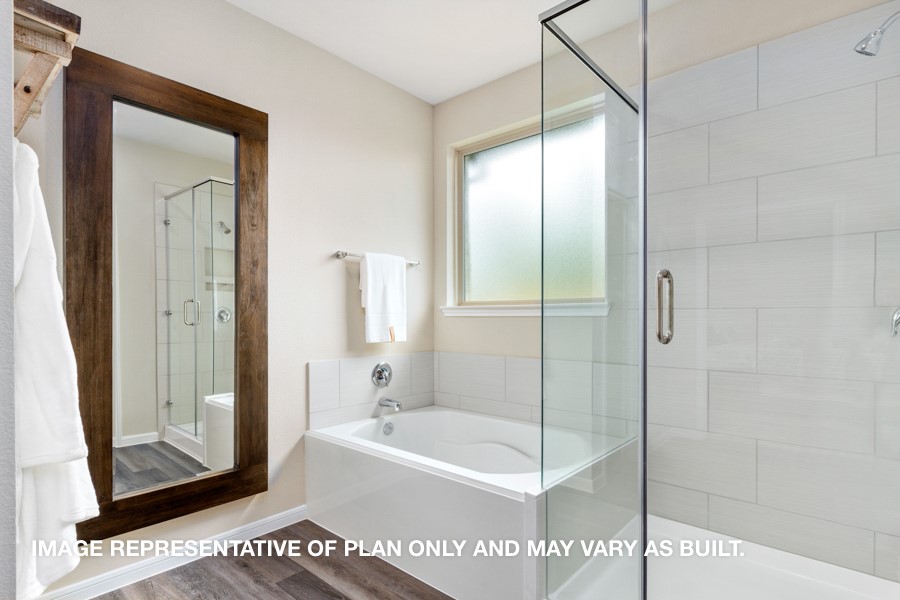 1421 Imperial Ranch Way Dayton, TX 77535 - Photo 8 of 19 a bathroom with a bathtub and a shower