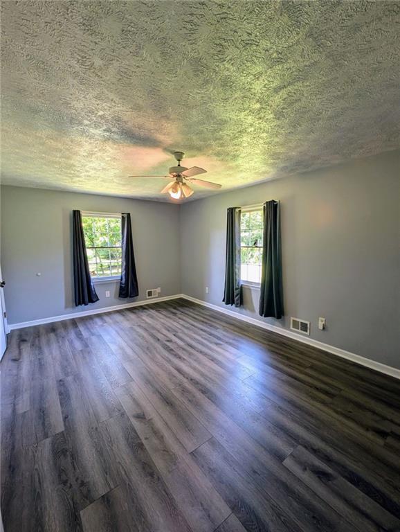 1848 Christian Circle Southeast Conyers, GA 30013 - Photo 7 of 11 a view of an empty room and window